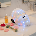 Paloma Beauties LED Face Mask — luxury flat lay with skincare products